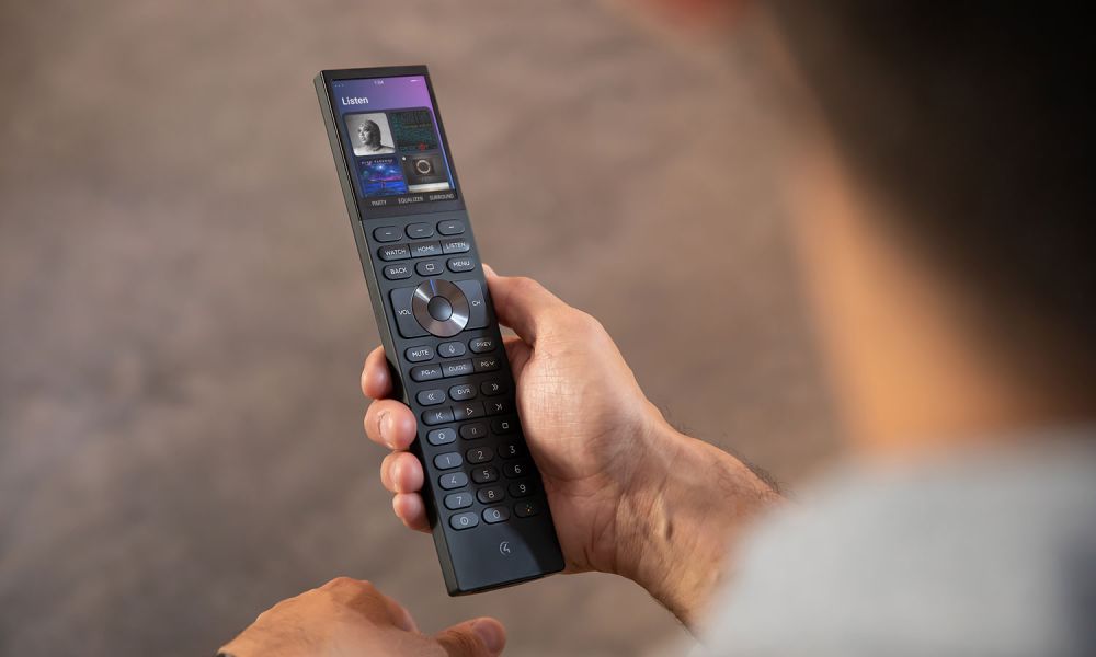 Control4 interface touch panel sitting on books