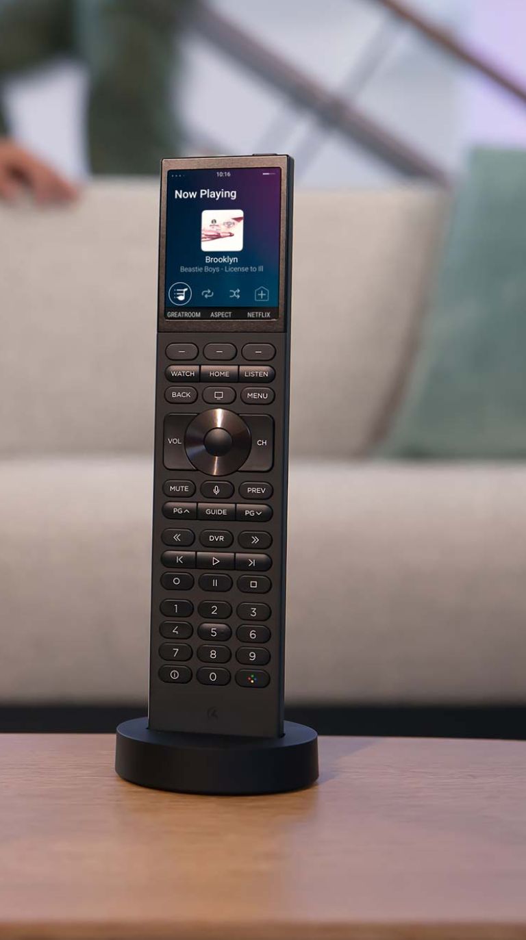 Up-close image of person interacting with Control4 touchpad
