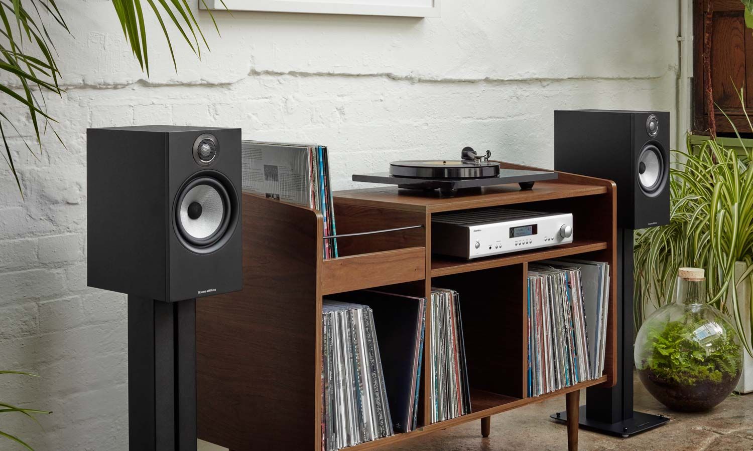 Bowers and Wilkins, large wooden speakers in room with white walls
